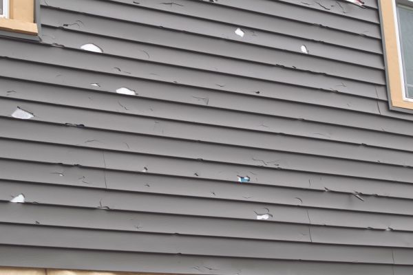 Damaged Siding Replacement in Keller