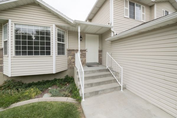 White Vinyl Siding Replacement in Keller